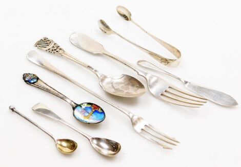 A group of small silver, to include a George V preserve spoon with shaped bright cut decorated bowl and pierced harp shaped terminal, Sheffield 1917, a white metal and enamel decorated souvenir spoons for Rio de Janeiro, sugar tongs, mustard spoon, pickle