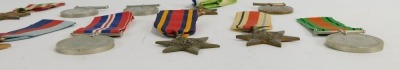 A group of WWII medals, comprising 1939-1945 Star, The Atlantic Star, The Africa Star, The Burma Star, The Italy Star, Defence Medal, four War Medals 1939-1945, together with Special Constabulary Long Service Medal Joseph Moore. (11) NB. Lots 1 to 50 in t - 3