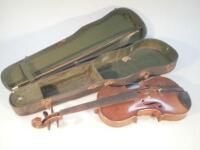 A 20thC violin. (AF).