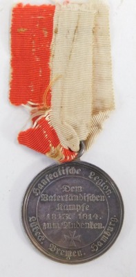 A Hanseatic Cities Napoleonic Campaigns Medal - Hanseatic Free Cities - War Commemorative Medal of the Hanseatic Legion, 1813-1814 (issued in 1815), silver, 36mm diameter, with replacement ribbon, fine condition. Issued to combatants who served the German - 3