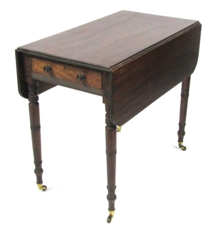 A late Georgian mahogany Pembroke table, with single frieze drawer, raised on turned legs, brass capped on castors, 71cm high, 82cm wide, 47cm deep, 91cm extended.