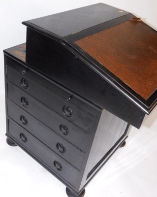 A Victorian ebonised Davenport, the hinged lid opening to reveal drawers and recesses, above a slide and four long drawers, raised on bun feet, 88cm high, 61cm wide, 61cm deep. - 6