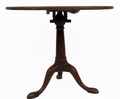 A Georgian mahogany supper table, with circular tilt top, resting on a bird cage, with gun barrel pillar and three out splayed legs with pad feet, 88cm diameter. - 2