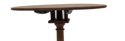 A Georgian mahogany supper table, with circular tilt top over a bird cage, on gun barrel turned pillar, and three out splayed legs with pad feet, 76cm diameter. (AF) - 2