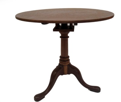 A Georgian mahogany supper table, with circular tilt top over a bird cage, on gun barrel turned pillar, and three out splayed legs with pad feet, 76cm diameter. (AF) - 3