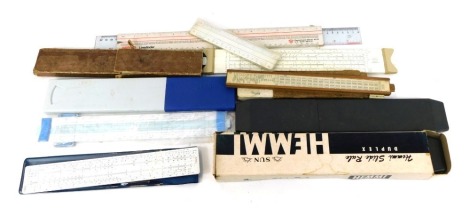 A group of slide rules, including Hemmi, Misco, and Unique.