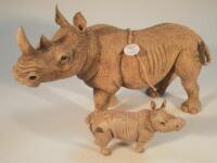 A Country Artists figure group of a standing rhino with young