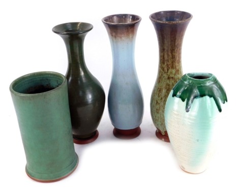 A group of Humphrey Wakefield studio pottery, comprising an Isles of Scilly Studio Pottery vase, three similar fluted rim vases, and a ribbed vase with mottled green border, printed marks. (5)