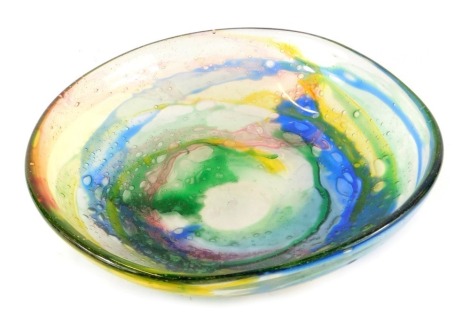 A Murano glass dish designed by Sylvio Bou, with trailing green, red, blue and yellow decoration, with air bubble inclusions, etched mark, 37cm diameter.