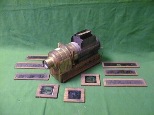 An early 20th C mahogany and brass magic lantern