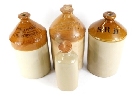 A two tone stoneware wine and spirit barrel, for William Dulley and Sons Limited on Wellingborough, 53cm high, another painted with initials S.R.D, jar impressed T Foster and Company, 45 Cheap Side EC, and a small jar with screw lid. (4)