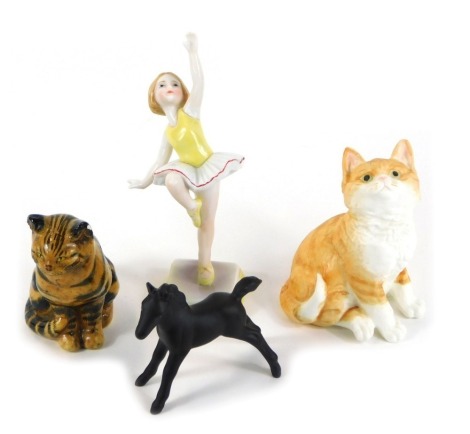 A Royal Worcester porcelain Days of the Week figure, modelled as Tuesday Girl, together with a Royal Worcester figure modelled as a Ginger, Kittens series, Beswick matt black foal, and a KS Davidson pottery figure of a seated cat. (4)