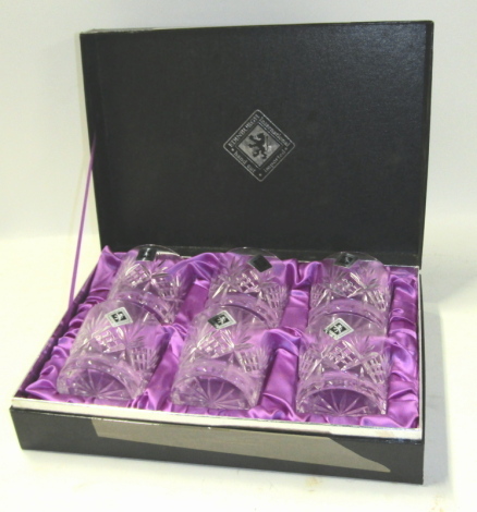 A cased set of six Edinburgh crystal whisky tumblers, 9cm high.