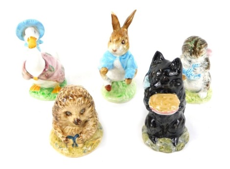 Five Beatrix potter figures, comprising Jemima Puddle-Duck, Miss Moppet, and Peter Rabbit, gold back stamp, together with Duchess with Pie, and Old Mister Pricklepin, brown back stamps. (5, AF)