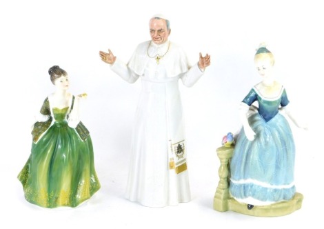 A Royal Doulton figure modelled as Fleur, HN2368, another modelled as Clarinda, HN2724, and a figure of his Holiness Pope John Paul II, HN2888. (3)