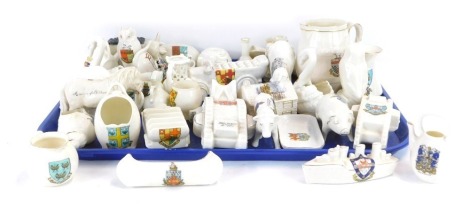 Goss and crested china, including a truck of coal from Arms of Norwich, battleship Arms of Woodbridge, two Goss models of British tanks, arms of Woodbridge and Arms of Jerusalem, model of an ancient salt pot found in the bed of river at Stockon on Tees, 