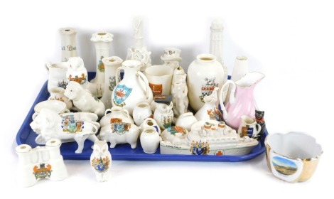 Goss and crested china, including a lifeboat memorial at Caister on Sea, arms of Caister, John Bull arms of East Harling, The Cenotaph arms of Great Yarmouth, and HMHS Anglia, arms of Southend on sea. (a quantity)