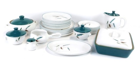 A Denby pottery part dinner service decorated in the Green Wheat pattern, including tureen and cover, plates, mustard pot, soup cups and covers. (a quantity)