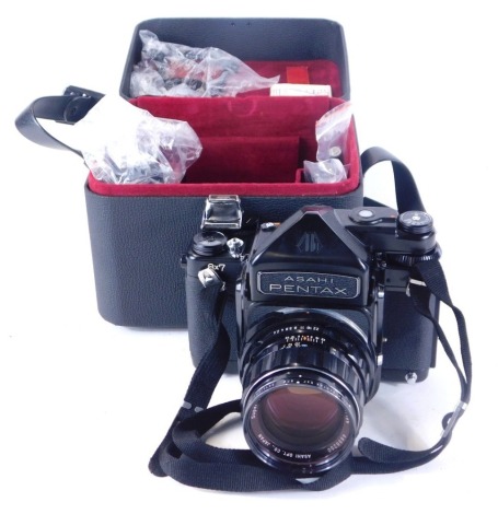 An Asahi Pentax 6x7 camera, in fitted case, with accessories.