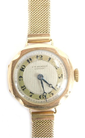 A 9ct gold JW Benson of London wristwatch, with a circular silvered and gold numeric dial with blue handles, the rear case inscribed WCC 16th September 1931, on a plated strap, 21g all in.