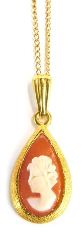 A 9ct gold cameo, the teardrop shaped cameo with a pendant clasp on fine link chain, 44cm long, 2.2g all in, boxed.