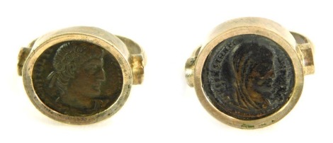 Two intaglio dress rings, each depicting warriors, on white metal bands stamped 925, size P½ and Q, 12.7g all in. (2)