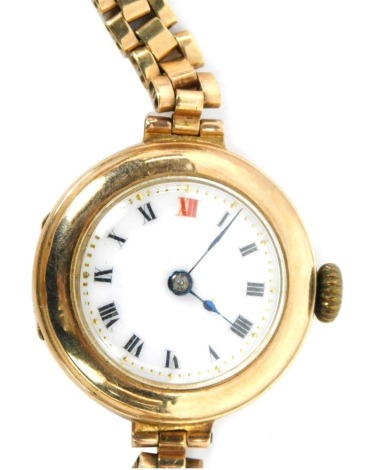 A late 20thC 9ct gold wristwatch, the circular watch head with white enamel Roman numeric dial, on a three bar bracelet, stamped 375 to watch case and strap, 22.8g all in.