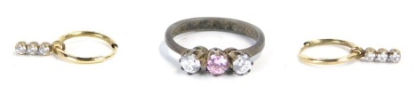 A silver paste stone set dress ring, set with pink and white stones, and a pair of hoop earrings.