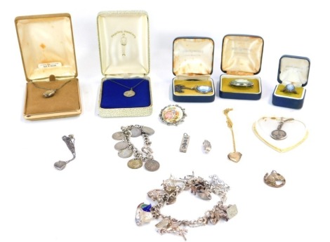 A quantity of costume jewellery, comprising silver charm bracelet, silver coin pendant, Wedgwood necklaces, silver lockets, etc. (1 tray)