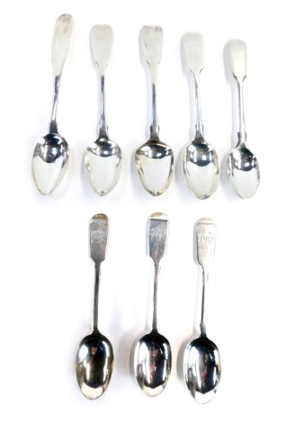 A group of Fiddle pattern silver teaspoons, two engraved bearing the initials JWJ, George V and later, varying dates, 4.48oz.