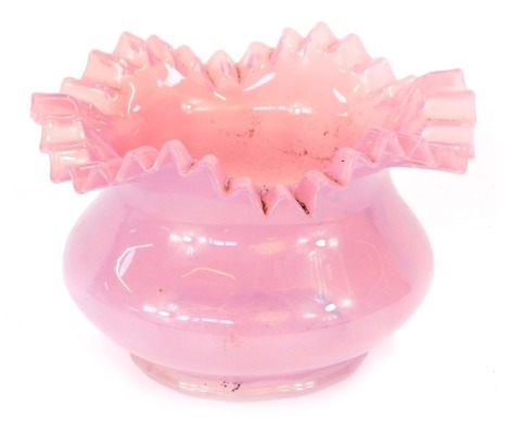 A Victorian pink glass bowl, with a shaped and fluted flared rim, 13cm high, 21cm wide.