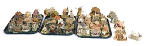 A group of Lilliput Lane and other collector's Cottages, to include Greenstead Church (x3), Morton Manor, Helmear Cottage, Pargeters Retreat, Soury Gill, Langdale Cottage, Wayside Cottage, Culloden Cottage, Tanner's Court, Inglewood, Cherry Cottage, The C