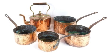 19thC and later copper wares, comprising copper kettle, 29cm high, and a set of four graduated copper pans, unmarked, the largest 22cm diameter.