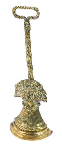 A brass wheatsheaf door stop, with moulded base on twist handle, 43cm high.