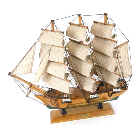 A HMS Bounty wooden ship model, 59cm high, 50cm wide.