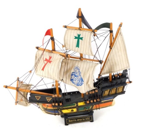 A Santa Maria wooden ship model, on stand, 44cm high, 44cm wide.