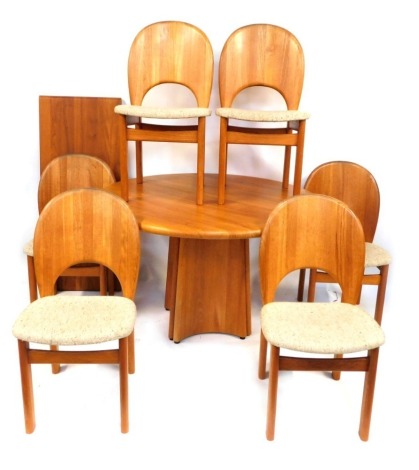 A Danish Glostrup Mobelfabrik teak circular dining table, with one additional leaf, raised on curve supports, 24cm high, 119cm diameter, 168cm extended, together with six single dining chairs, with oatmeal wool seats, raised on turned legs. (7)