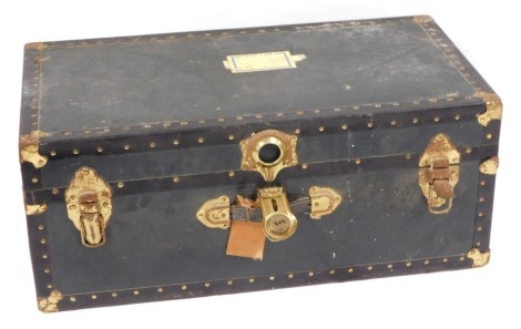 A blue bound canvas trunk, with brass buckled corners and supports, 31cm high, 78cm wide, 42cm deep.