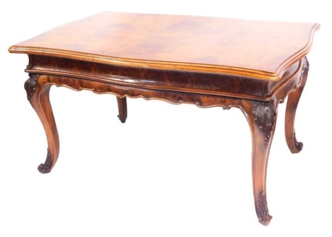 A 19thC walnut dining table, with a moulded top on outsplayed carved legs, 82cm high, 152cm wide, 101cm deep.