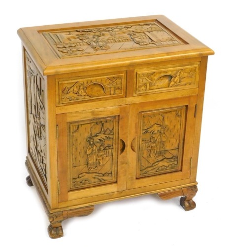 A lightwood and yew wood side cabinet, with a carved and moulded rectangular top above arrangement of two cupboard doors, on bracket feet, 67cm high, 60cm wide, 42cm deep.