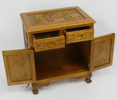 A lightwood and yew wood side cabinet, with a carved and moulded rectangular top above arrangement of two cupboard doors, on bracket feet, 67cm high, 60cm wide, 42cm deep. - 2