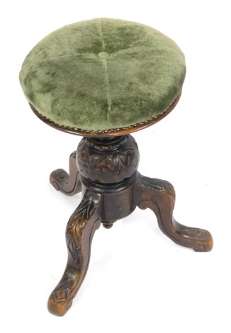 A Victorian rise and fall piano stool, with green materiel top with central button, on tripod base, 50cm high, 31cm diameter.