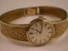 An Omega lady's 9ct gold bracelet wrist watch