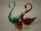 Two Whitefriars fluted swans in ruby and aqua and a Wedgwood Art Glass bird (3)