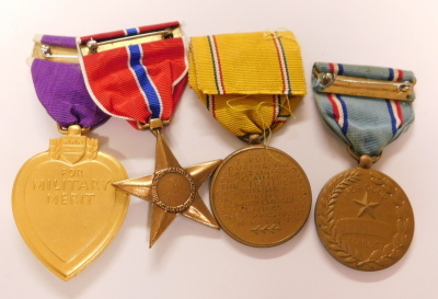 Four US American service medals and awards, being the Purple Heart, all services Bronze Star from 1944, Defence Service est: 28.6.41 and Airforce Good Conduct medal. (4) - 2