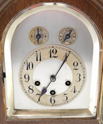 A late 19thC chiming bracket clock, with arched plate back, 13cm Arabic dial, fast slow chime silent features, in domed case, flanked by cylindrical columns on brass feet, Westminster chime, on four gongs, hour striking, 43cm high. - 2