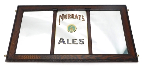 A Murray's Ale advertising mirror, in oak frame, in three sections, stencilled with red and blue lettering with central trade mark and crest, 61cm high, 109cm wide.