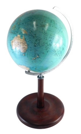 A 20thC Kaden Columbus terrestrial globe, on chrome axis and wooden stand, stamped Berlin Stuttgart, 28cm diameter.