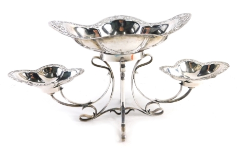 An Edward VII silver centrepiece epergne, by James Dixon and Son, centred by a removable dish flanked by two smaller dishes, on an entwined base, Sheffield 1909, 19cm high, 17oz.