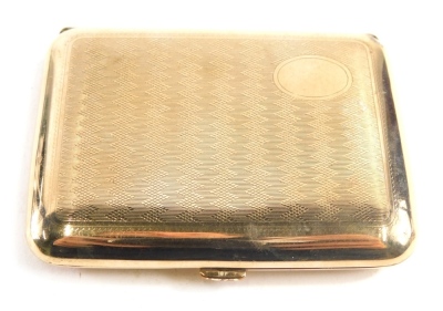 A 20thC gold plated cigarette case, partially engine turned with vacant cartouche, 9cm long.